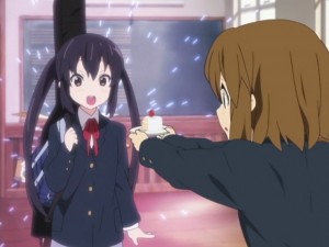 Azusa-chan seems to like cake even though she doesn't like tea parties.