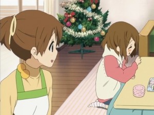Caught red handed by Ui! Yui can't seem to resist herself when it comes to delicious looking food.