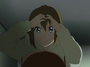 She almost looks like Yui... with the bangs down