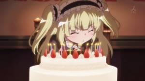 Kobato blows out the candles.