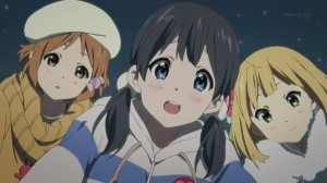 Tamako is happy when she sees what is inside the box.