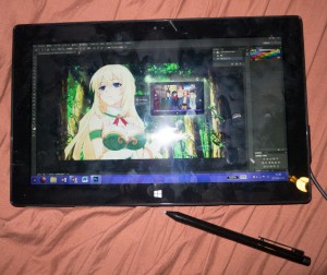 Photoshop works great with the included pen.