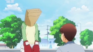 I wonder who give Inami ideas to wear a paper bag and boxing gloves.